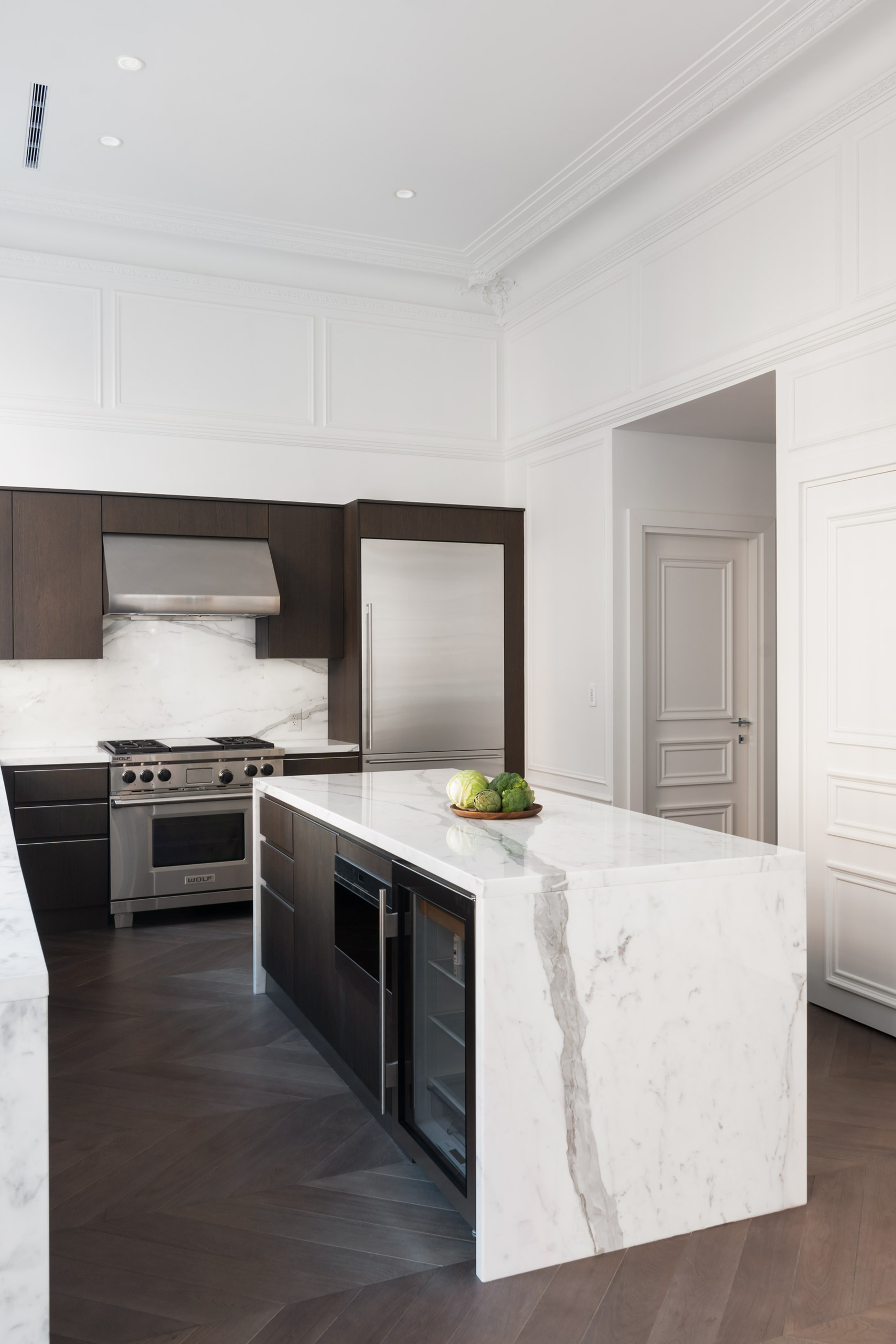 Carrara marble waterfall countertop in luxury Boston condo.