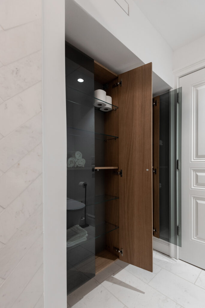 Bathroom linen closet by Stocco in luxury Back Bay Boston apartment.